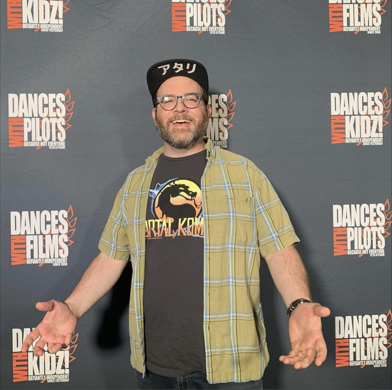 Rob Reider at a festival photo wall