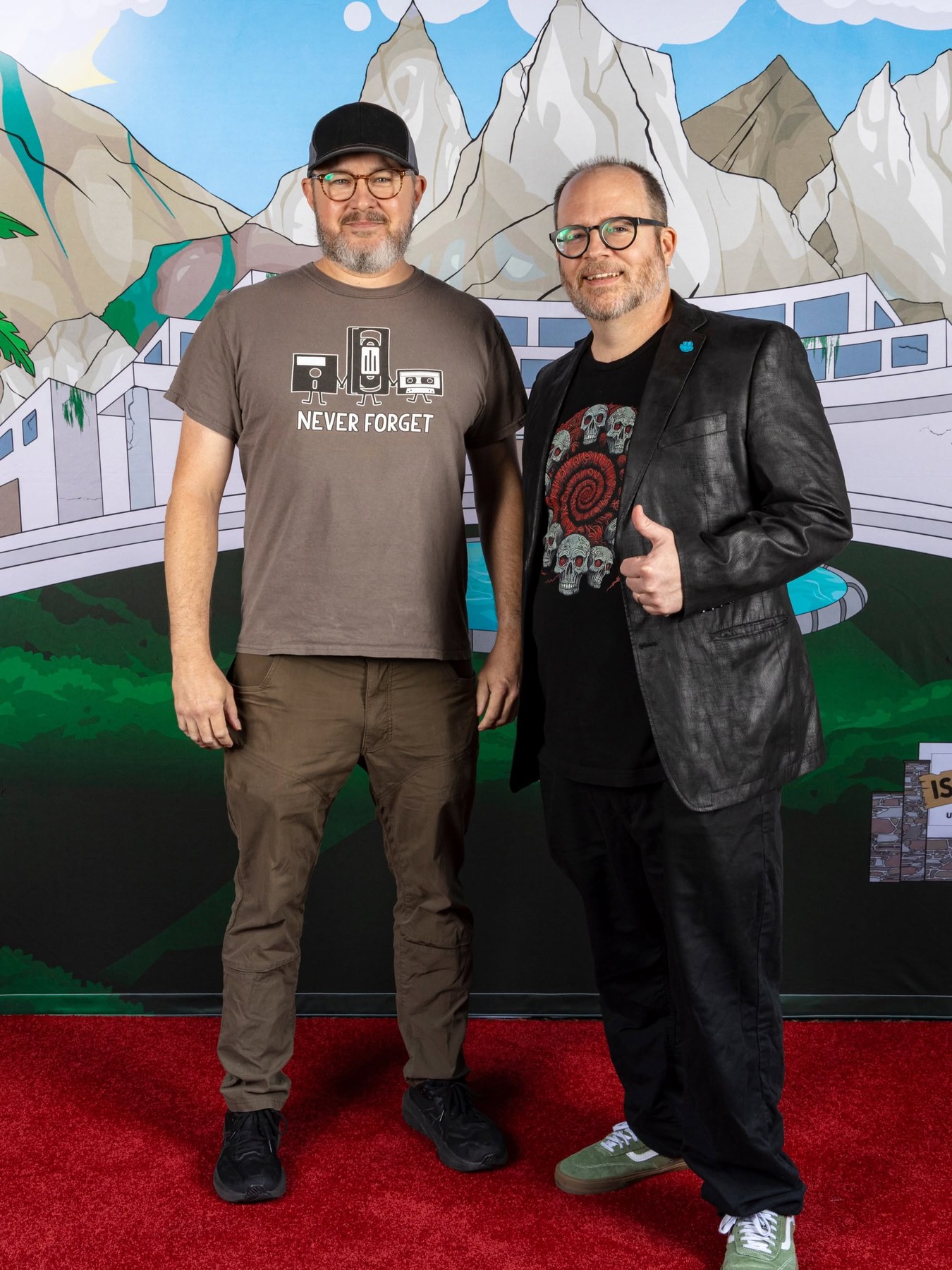 Two guests posing on the Isla Monstro red carpet
